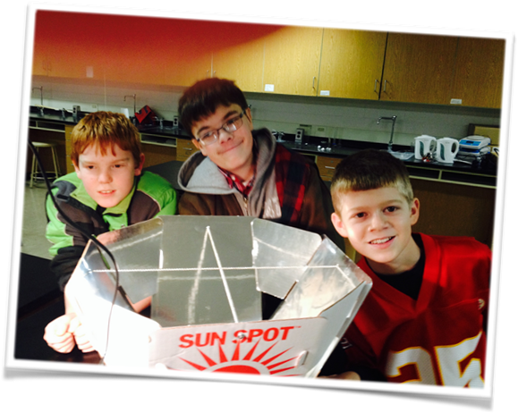 Students with a solar oven