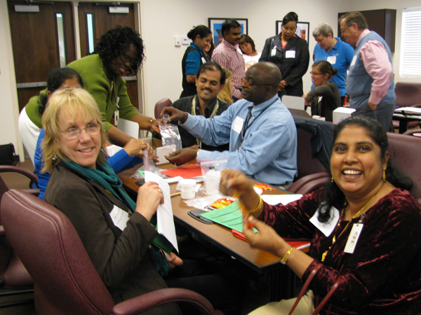 Teachers networking at a conference event