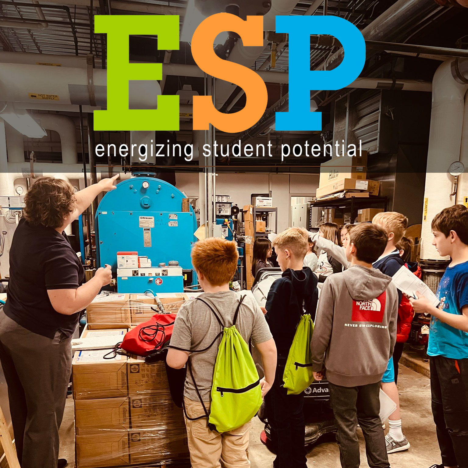Photo of students in an industrial power plant with the ESP logo superimposed over it